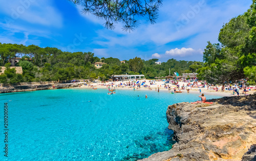 Turquoise clean water in Cala Mondrago beach of Mallorca island - Spain