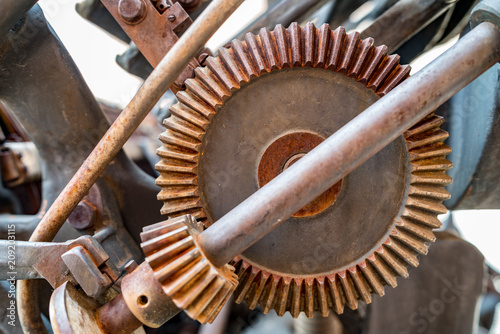 Old printing press - rotary machine - polygraphic equipment - big cog wheel photo