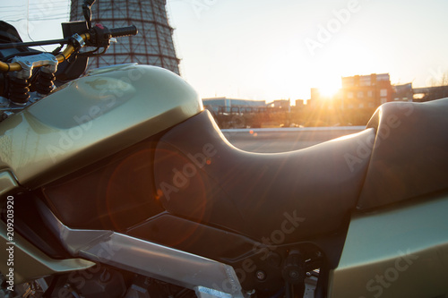 motorcycle at sunset, motorcycle details