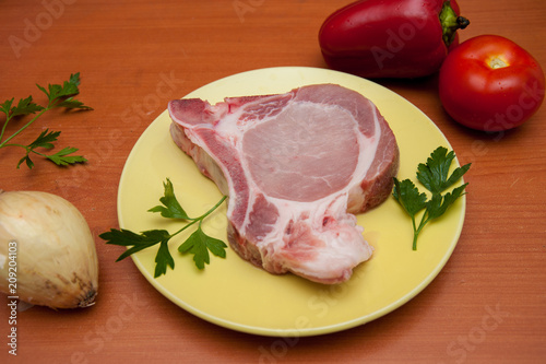 pork for cooking, meat on a plate