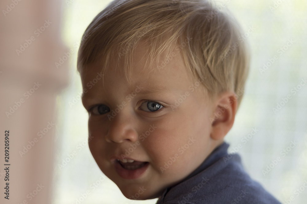 Image of cute baby boy, closeup portrait of adorable child on blurred background, sweet toddler with blue eyes, healthy childhood, perfect caucasian infant, lovely kid, innocence concept Image of cute baby boy, closeup portrait of adorable child on blurred background, sweet toddler with blue eyes, healthy childhood, perfect caucasian infant, lovely kid, innocence concept