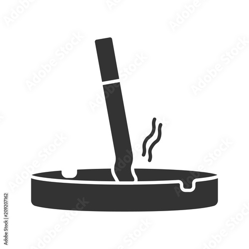 Ashtray with stubbed out cigarette glyph icon