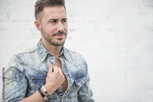 Male model posing in the park