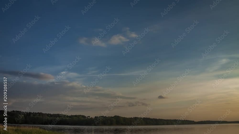 Stunning sunset over the lake in summer, timelapse, 4K Stunning sunset over the lake in summer, timelapse, 4K