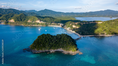 Aerial drone view of a beautiful tropical landscape with towering limestone islands in the ocean