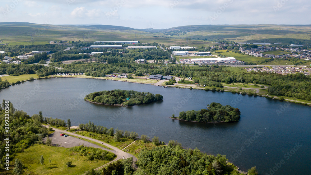 Aerial view of Bryn Bach park and lake in Tredegar, South Wales