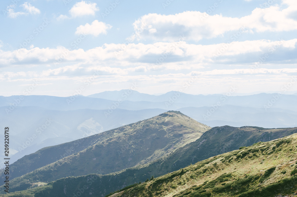 Mountains hills landscape green clouds