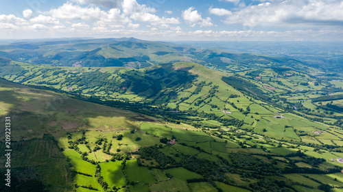 Aerial view of green farmland and fields in the rural Welsh countryside photo