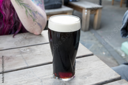 Full pint of Guinness with a head