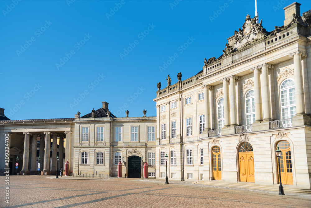 custom made wallpaper toronto digitalbeautiful Amalienborg Square with historical buildings and columns at sunny day, copenhagen, denmark