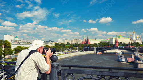 Tourist takes pictures of Moscow city, Russia