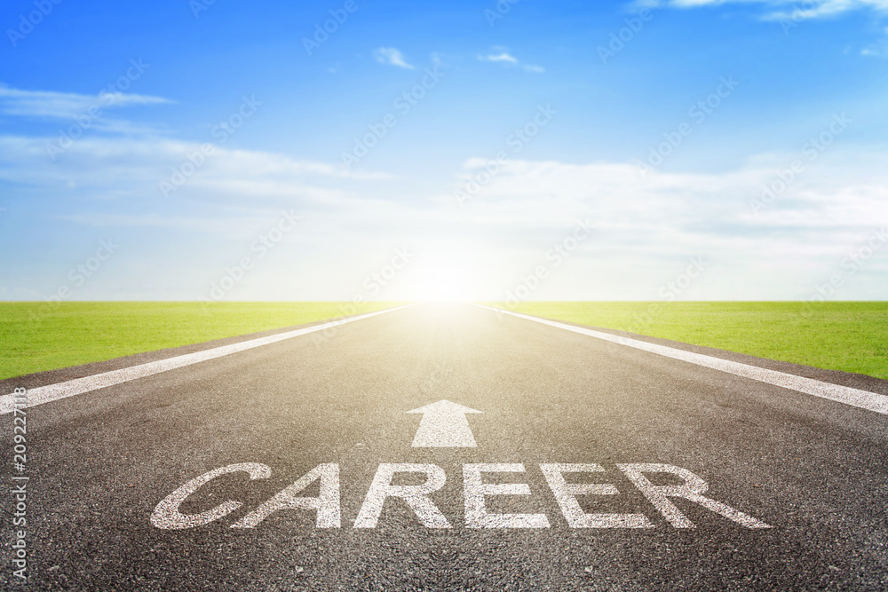 Obraz premium Asphalt road with arrow guideline and career letters painted on the surface. An image of a road milestones are representative of success in the future goal