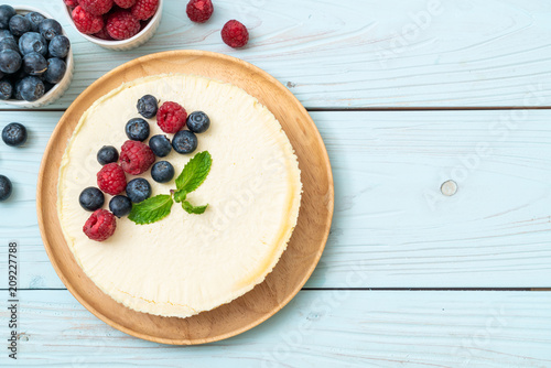 Homemade cheesecake with raspberries and blueberries