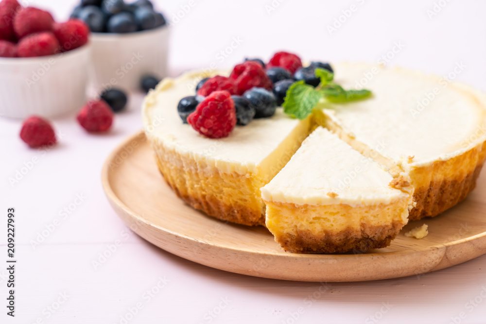 Homemade cheesecake with raspberries and blueberries