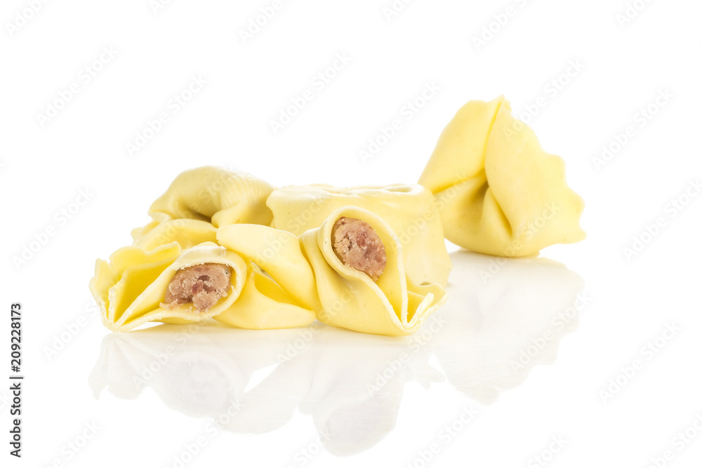 Tortellini raw pasta stuffed with meat isolated on white background Italian traditional. Tortellini raw pasta stuffed with meat isolated on white background Italian traditional.