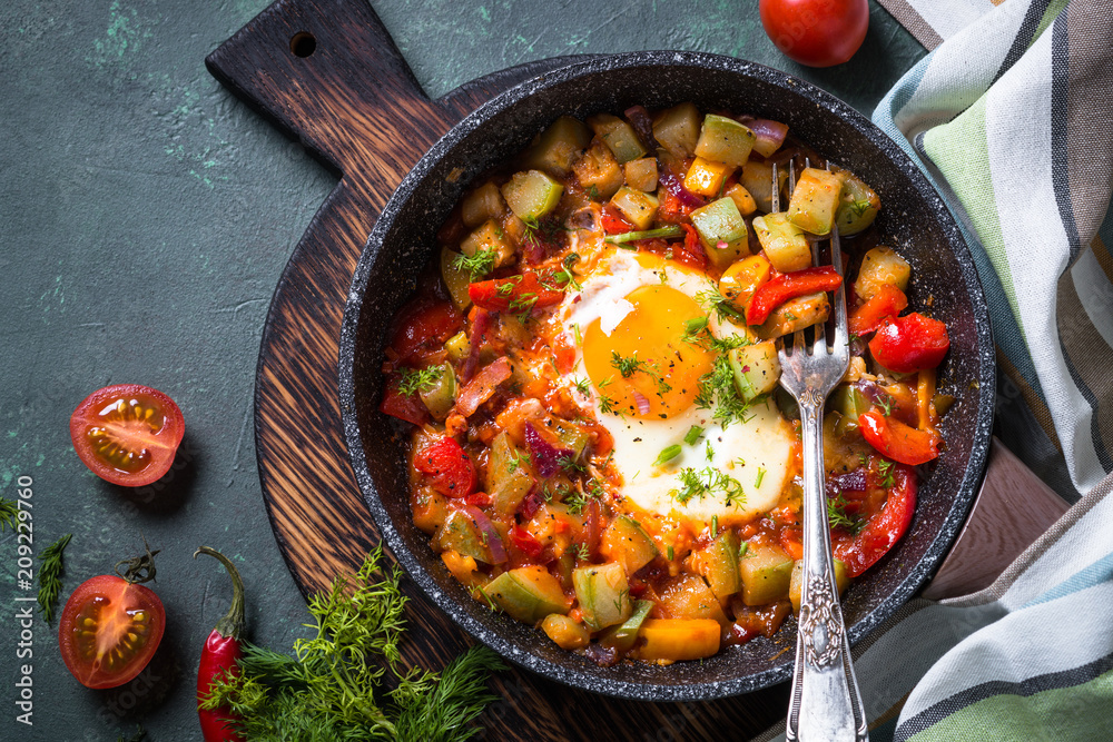 Fried egg with vegetables. Fried egg with vegetables.
