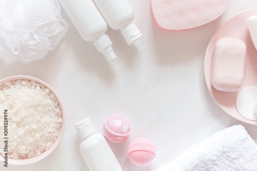 Soft light bathroom decor for advertising, design, cover. Towels, soap, massage brush, sea salt, salt bomb, cosmetic bottles. Aromatherapy, body care, aroma massage. mock up. Flat lay, top view, copy Soft light bathroom decor for advertising, design, cover. Towels, soap, massage brush, sea salt, salt bomb, cosmetic bottles. Aromatherapy, body care, aroma massage. mock up. Flat lay, top view, copy