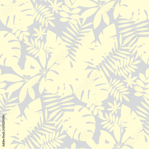 Pale ivory color tropical leaves seamless pattern