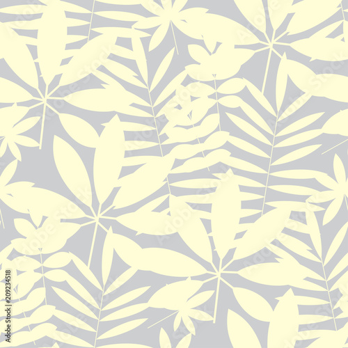 Pale ivory color tropical leaves seamless pattern