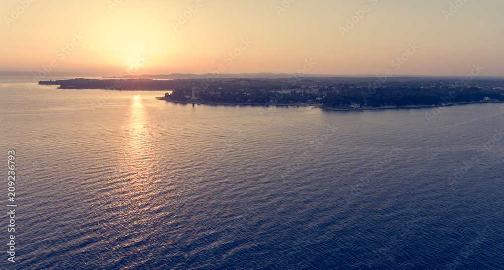 Spectacular aerial seascape panorama at sunrise.