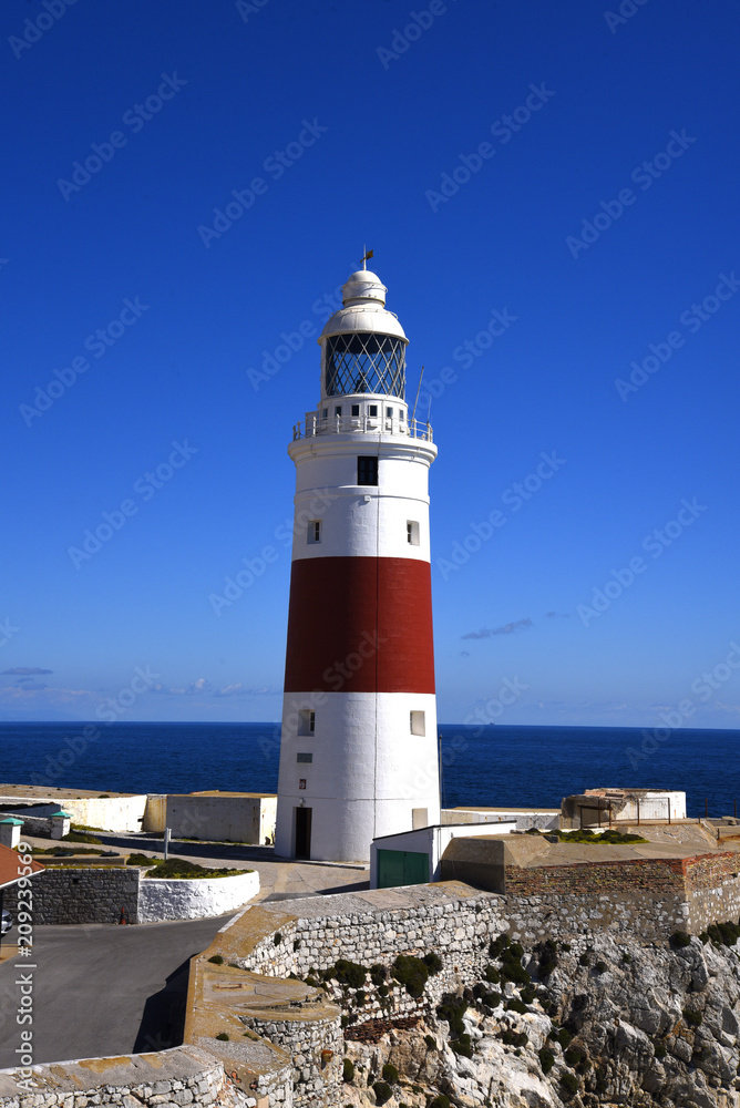 Lighthouse at Europa Point on the Rock of Gibraltar at the entrance to the Mediterranean Sea
