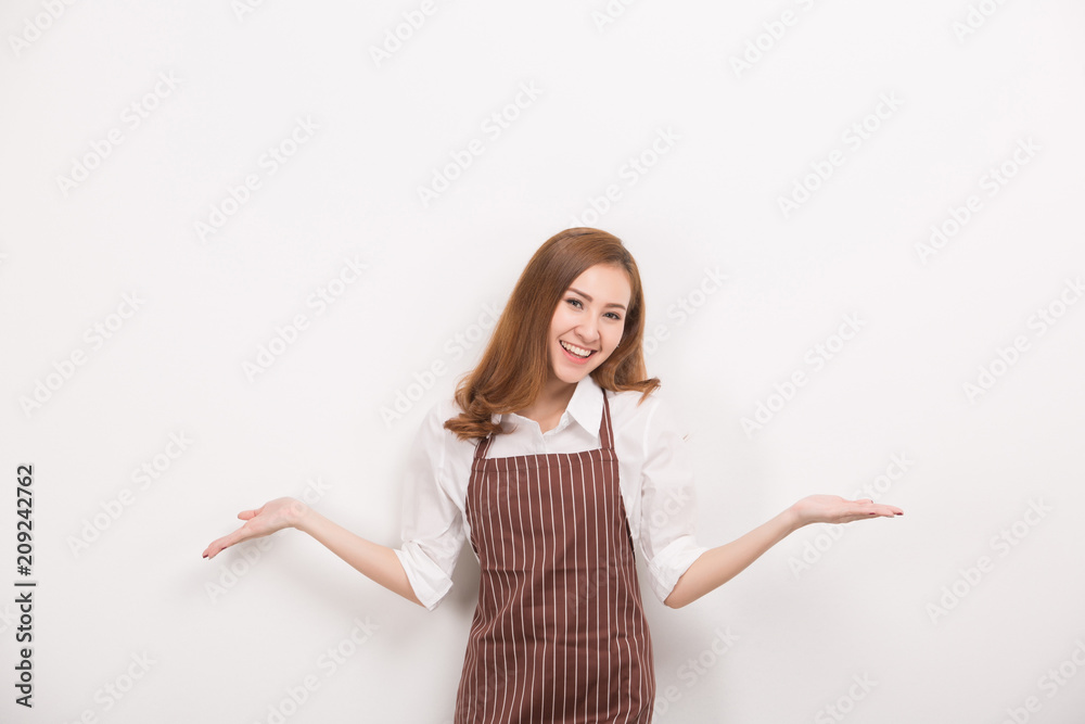 Beautiful happy young woman wearing kitchen apron , isolated on white Beautiful happy young woman wearing kitchen apron , isolated on white