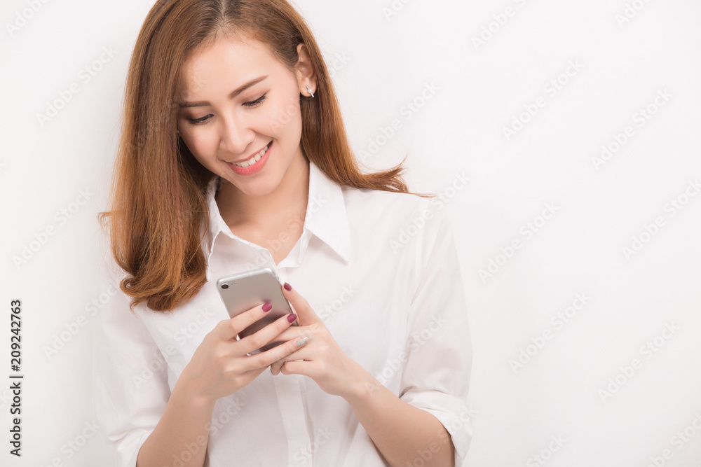 asia woman using smart phone on white background asia woman using smart phone on white background