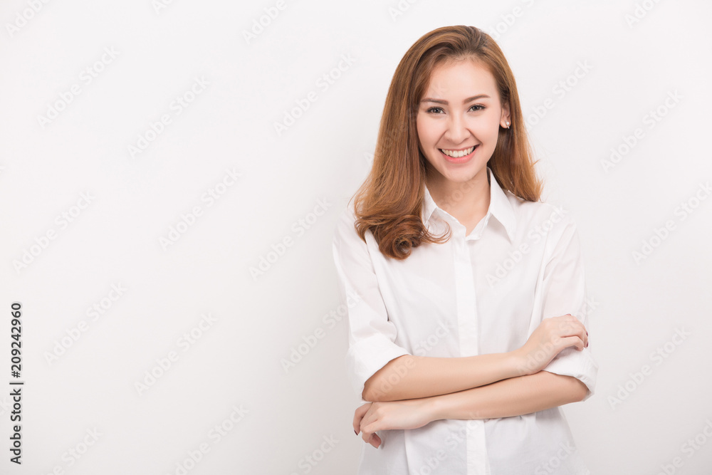 Smiling woman with crossed arms. Portrait isolated on white background. Smiling woman with crossed arms. Portrait isolated on white background.