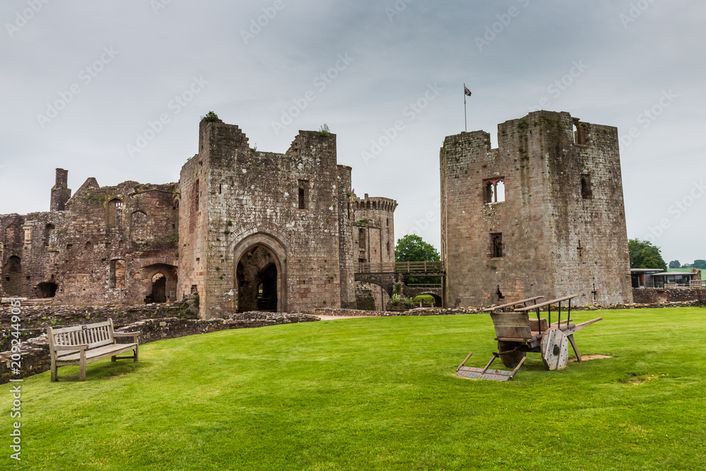 Walls and towers of a ruined ancient medieval castle (Raglan Castle)