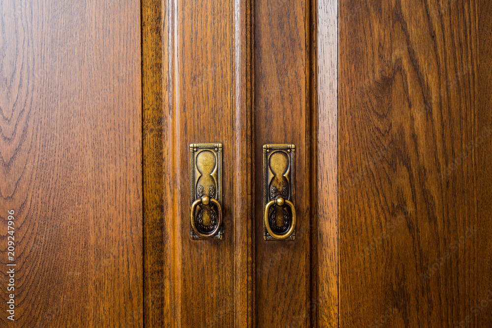 Fototapeta premium Closeup of vintage wooden cabinet. antique