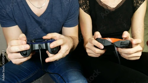 boy and girl are fighting against each other in a game on the gamepads