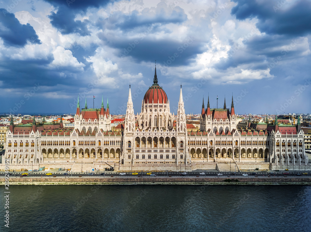 Budapest, Hungary - Aerial view of the Houses of Parliament building of Hungary at daytime with beautiful sky and clouds Budapest, Hungary - Aerial view of the Houses of Parliament building of Hungary at daytime with beautiful sky and clouds