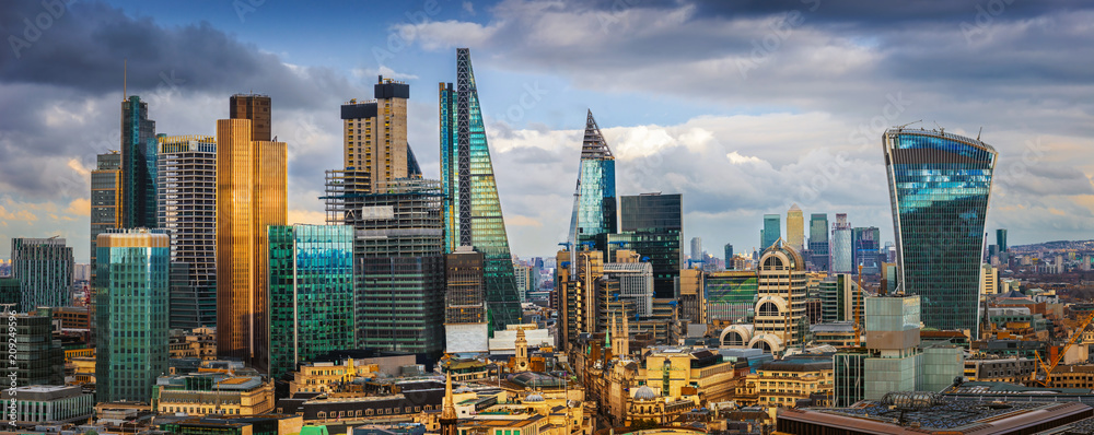 London, England - Panoramic skyline view of Bank and Canary Wharf, central  London's leading financial districts with famous skyscrapers and other  landmarks at golden hour sunset Stock Photo | Adobe Stock