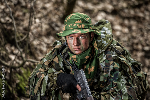 Russian sniper during patrol