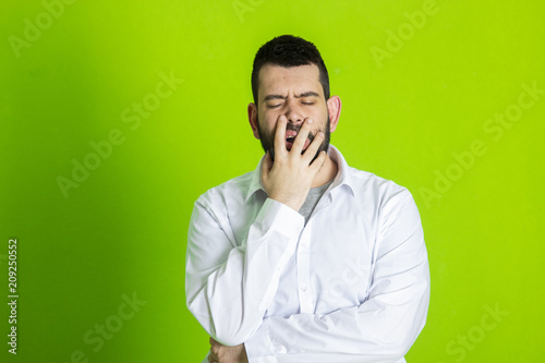 Tired or bored Caucasian hipster young