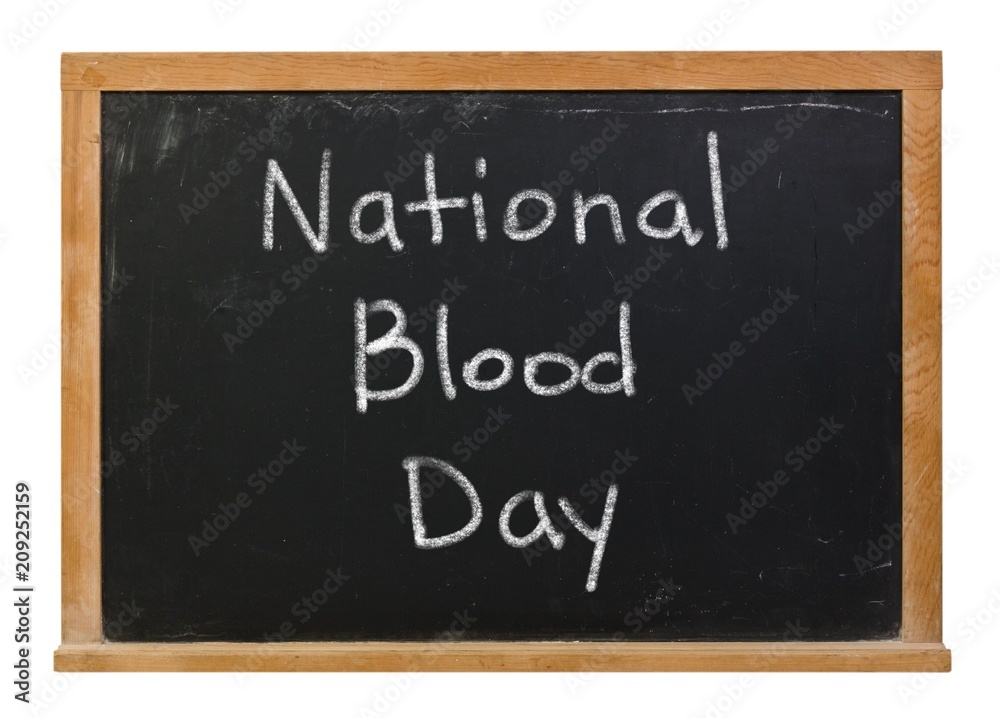 National Blood Day written in white chalk on a black chalkboard isolated on white National Blood Day written in white chalk on a black chalkboard isolated on white