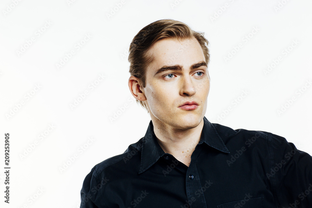 Portrait of a young expressive man on white studio background Portrait of a young expressive man on white studio background