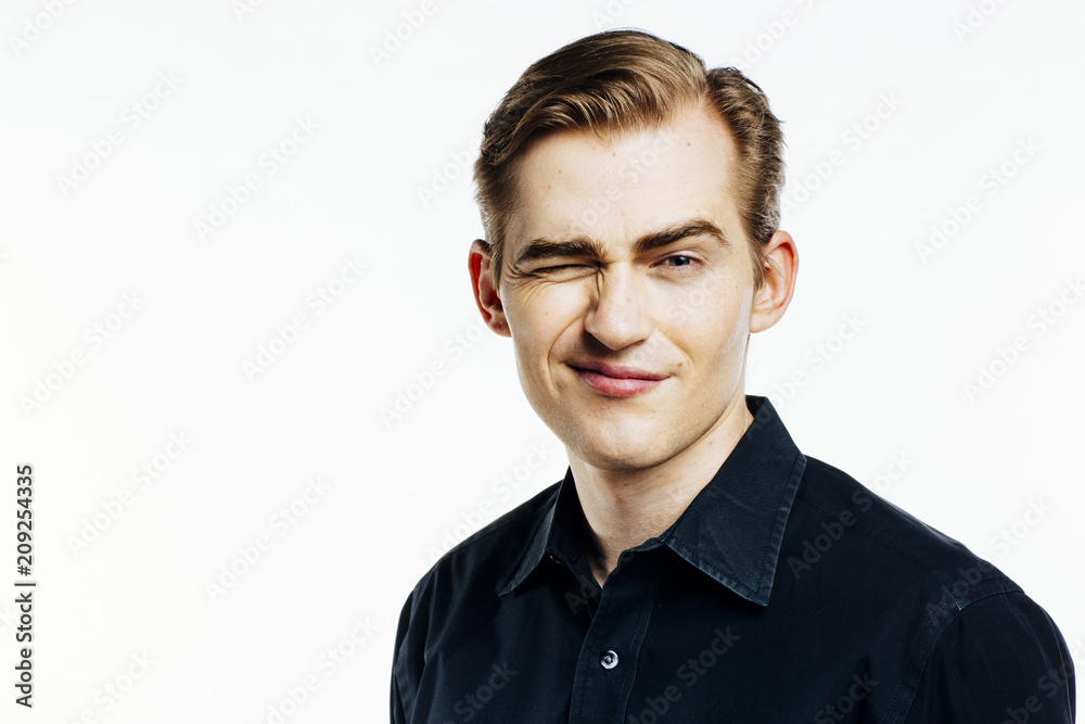 Portrait of a young expressive man on white studio background Portrait of a young expressive man on white studio background
