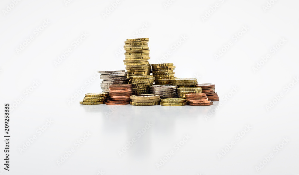 Stack of gold and silver coins isolated on white background with clipping path (without a shadow). Growing and saving money concept. Stack of gold and silver coins isolated on white background with clipping path (without a shadow). Growing and saving money concept.
