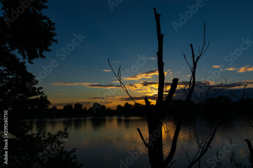 Beautiful sunset on Mystic River at Everett Massachusetts photo