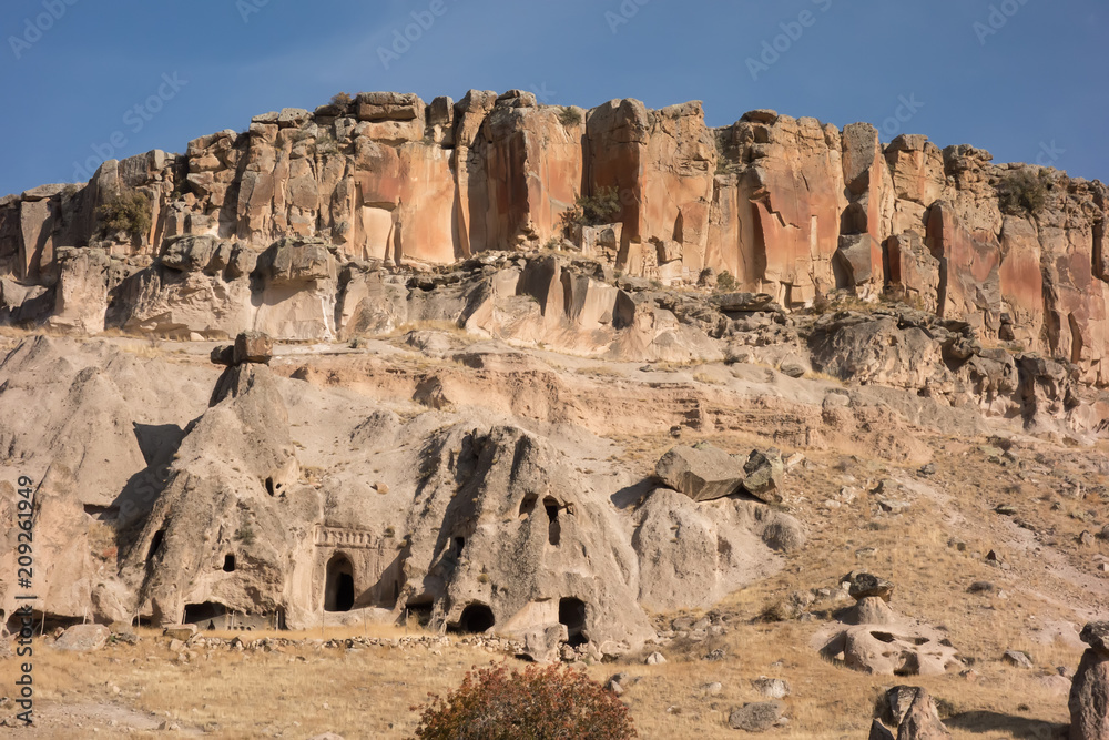 View of Cappadocia. Turkey. A geological formation consisting of volcanic tuff with cave dwelling. Cave monastery in Goreme Central Anatolia.