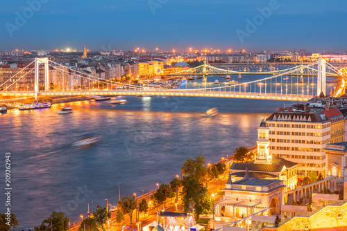 Aerial cityscape view with illuminated Elisabeth bridge during the twilight in Budapest, Hungary