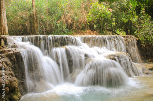 Kuang Si Falls nearby Luang Prabang, Laos. Jungle landscape. Long exposure photography concept