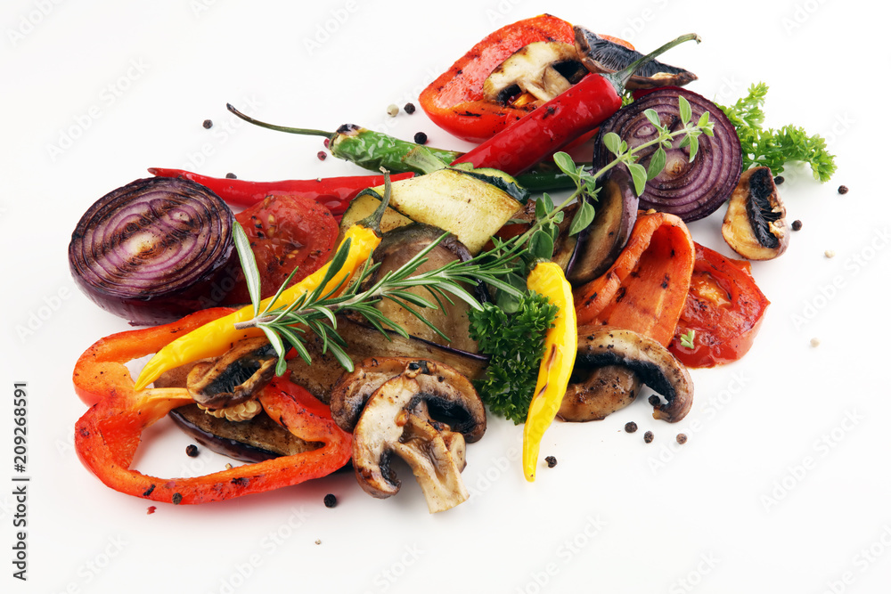 Grilled vegetables. Tomatoes, zucchini, bell pepper and fresh herbs. Grilled vegetables. Tomatoes, zucchini, bell pepper and fresh herbs.