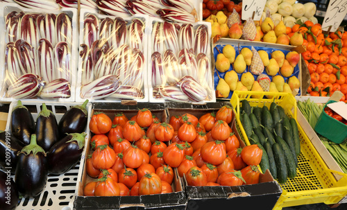 boxes full of fresh fruits and vegetables at market photo