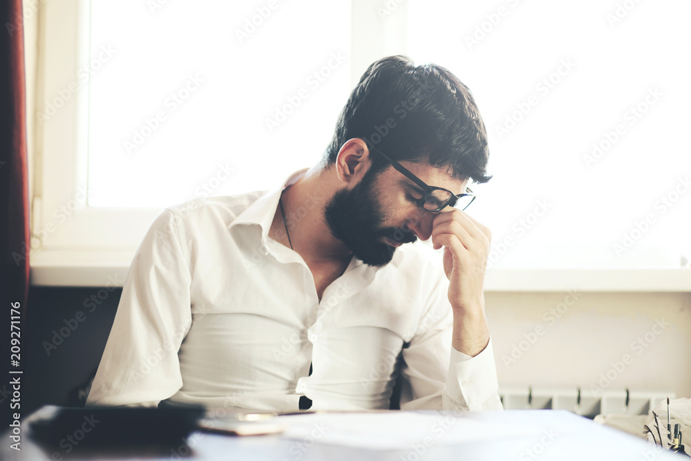 young depression businessman hand on head young depression businessman hand on head