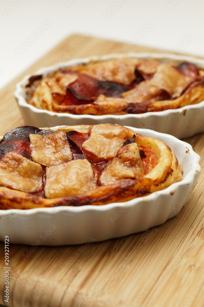 Tartelette with tomatos, chorizo and parmesan Tartelette with tomatos, chorizo and parmesan