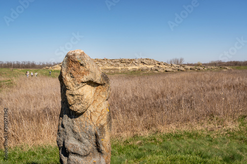 Stone idol in the national-historical and archaeological reserve Stone Tomb , Ukraine photo