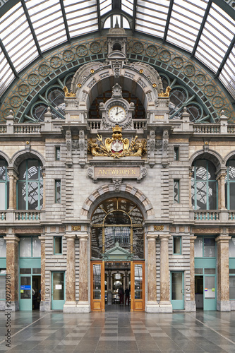 Antwerp, Belgium. The central train station of Antwerp, built in the eclectic style by architects .Louis Delacenserie and Charles Poupaert which opened in this form in 1905. photo