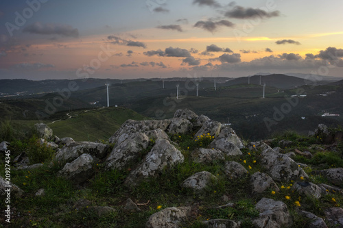 Sunset over Cabeço de Montachique, Loures, Lisboa, Portugal. View towards the wind towers to the west. photo